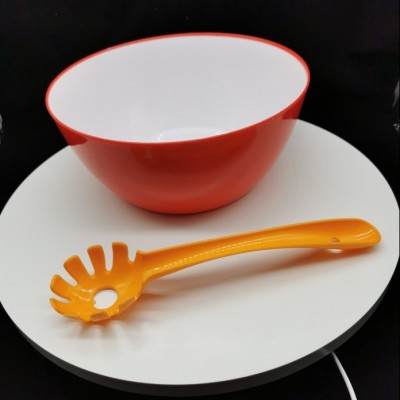 kitchen food  salad bowl with server Plastic spoon and fork